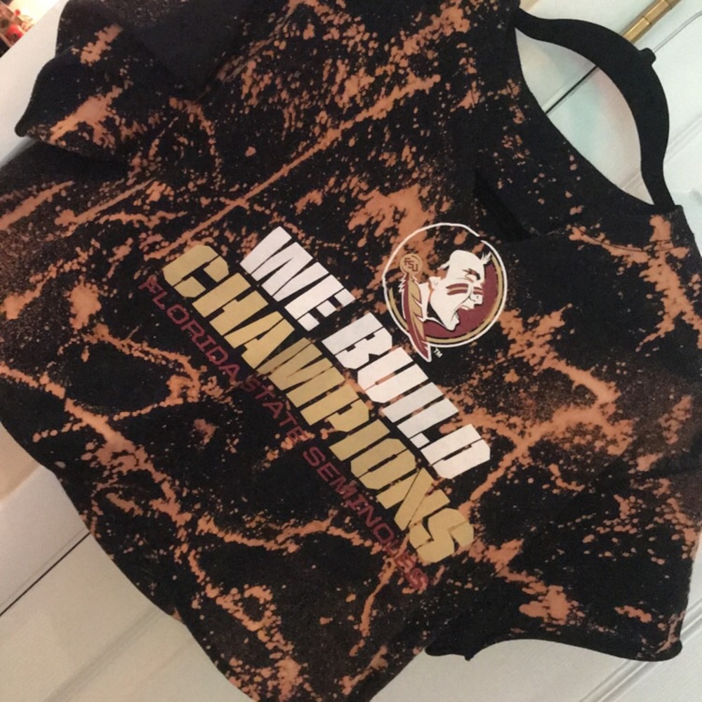 We build champions tee